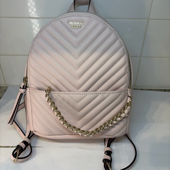 Victoria's Secret Handbags - Victoria’s Secret Blush Pink Quilted Mini Backpack Gold Chain Straps